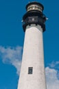 Functioning, tropical lighthouse with three windows, metal walk around