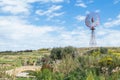 A functioning wind pump, used to extract water in agriculture in the island of Gozo, Malta Royalty Free Stock Photo