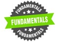 fundamentals sign. fundamentals round isolated ribbon label.