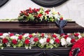 Funeral, beautifully decorated with flower arrangements coffin Royalty Free Stock Photo