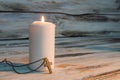 Funeral ceremony concept, burning candle with light. Royalty Free Stock Photo