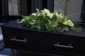 Funeral flowers on a casket