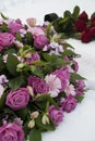 Funeral flowers in the snow on a cemetery