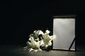 Funeral photo frame and lily flowers