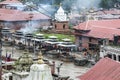 Funeral pyres are tended for many hours until cremated corpses are turned to ash at Pashupatinath Hindu Temple and the Burning Gha