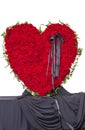 Funeral wreath of red roses in the shape of a heart Royalty Free Stock Photo