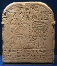 Funerar Stela of the Egyptian young boy Merysekhmet. He is shown sitting on his mother knee