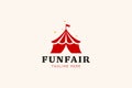 Vibrant Funfair Logo Showcasing a Striped Circus Tent and Festive Elements Royalty Free Stock Photo