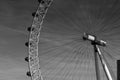 Funfair wheel looking up the sky with a partial closeup