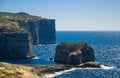 Fungus and Gebla Rock cliffs near Azure window, Gozo island, Malta Royalty Free Stock Photo