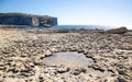 Fungus and Gebla Rock cliffs near Azure window, Gozo island, Malta Royalty Free Stock Photo