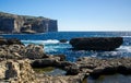 Fungus and Gebla Rock cliffs near Azure window, Gozo island, Malta Royalty Free Stock Photo