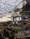 The funicular carries passengers from the city center to the old port , in Fira Santorini island ,Greece.