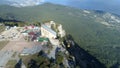 Funicular moves to the top of the mountain, beautiful views of the sea, bay and mountains from the window. Shot. Aerial