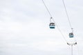 Funicular or ropeway and public transport through gulf or river or channel in Lisbon in Portugal. Royalty Free Stock Photo