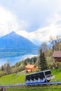 Funicular to Niederhorn mountain with view of Lake Thun and Niesen mountain in Switzerland
