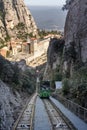 Montserrat, Spain - Feb 23, 2020: Funicular tram way view of Abbey of Montserrat near Barcelona in Spain