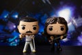 Funko POPO vinyl figures of Freddie Mercury and John Deacon(Queen) on concert stage background Royalty Free Stock Photo