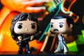 Funko POPO vinyl figures of Freddie Mercury and John Deacon(Queen) on concert stage background Royalty Free Stock Photo