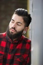 Funky guy with beard and piercings Royalty Free Stock Photo