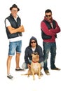 Funky hip hop guys with pitbull dog Royalty Free Stock Photo
