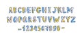 Funky latin font or childish english alphabet decorated with paint stains and dots. Colorful letters arranged in Royalty Free Stock Photo