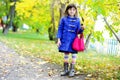 Funky little child girl in autumn