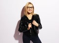 Funky style beauty. Beautiful young blond woman wearing glasses