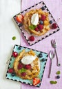 Funnel cakes with fresh berries and whipped cream Royalty Free Stock Photo