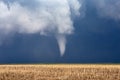 Funnel cloud touching down and becoming a tornado. Royalty Free Stock Photo