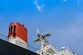 Funnel ship with antenna and bridge deck of Cargo ship. Royalty Free Stock Photo