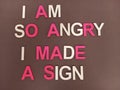 Funny abstract I am so angry so I made a sign protest sign on a brown background