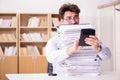 The funny accountant bookkeeper working in the office Royalty Free Stock Photo