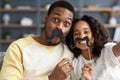 Funny african american father and daughter taking selfies Royalty Free Stock Photo