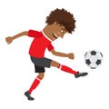 Funny African American soccer football player wearing red t-shirt running kicking a ball and smiling Royalty Free Stock Photo