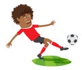 Funny African American soccer football player wearing red t-shirt running kicking a ball and smiling Royalty Free Stock Photo