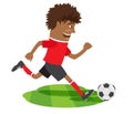 Funny African American soccer football player wearing red t-shirt running kicking a ball and smiling Royalty Free Stock Photo