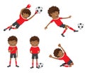 Funny African American soccer football player wearing red t-shirt running, standing and kicking a ball and smiling Royalty Free Stock Photo