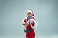 Funny guy in christmas hat. New Year Holiday. Christmas, x-mas, winter, gifts concept.