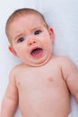 Funny and angry baby face Royalty Free Stock Photo