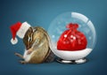 Funny animal chipmunk dressed as santa with snow ball and sack, Royalty Free Stock Photo