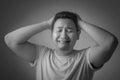 Funny Asian Man Crying Royalty Free Stock Photo