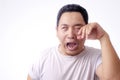 Funny Asian Man Crying Royalty Free Stock Photo