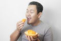 Funny Asian Man Enjoys Durian fruit Royalty Free Stock Photo