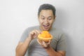 Funny Asian Man Enjoys Durian fruit Royalty Free Stock Photo