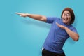 Funny Asian Man Smiling and Making Dab Movement Royalty Free Stock Photo