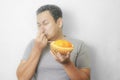 Funny Asian Man With Stinky Durian Fruit Royalty Free Stock Photo