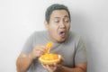 Funny Asian Man With Stinky Durian Fruit