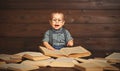 Funny baby with books in glasses Royalty Free Stock Photo