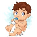 Funny baby boy drinking milk with bottle Royalty Free Stock Photo